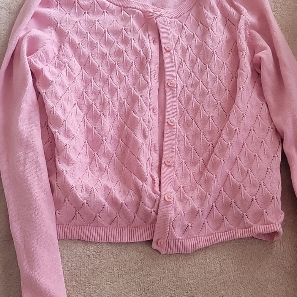 A pink wonder nation Cardagain size XXL it runs as a small